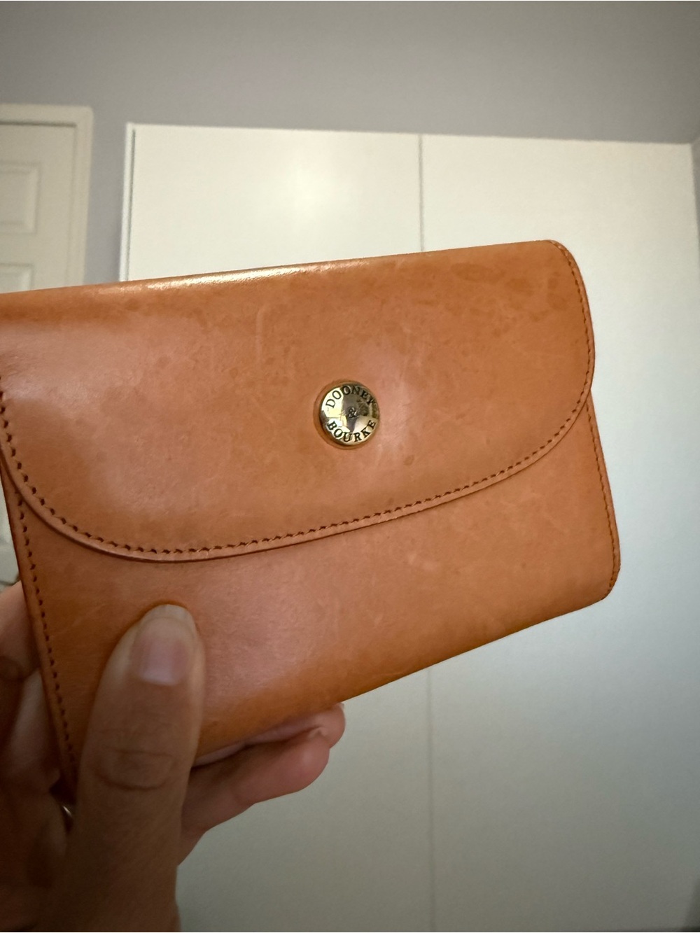 Dooney & Bourke Cognac Leather Fold Wallet with Gold-Tone Logo